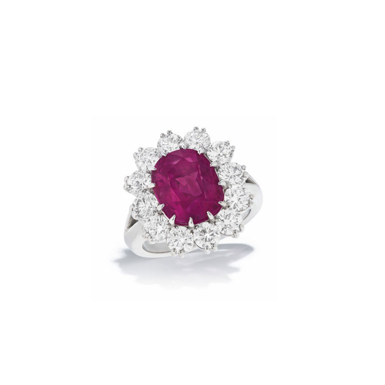 Platinum colored sapphire and diamond ring