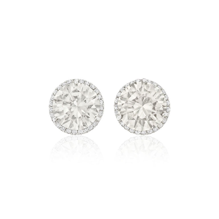 White and yellow gold diamond stud earrings