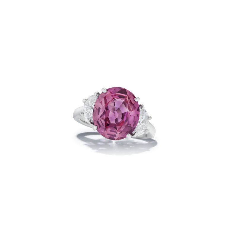 Platinum colored sapphire and diamond ring