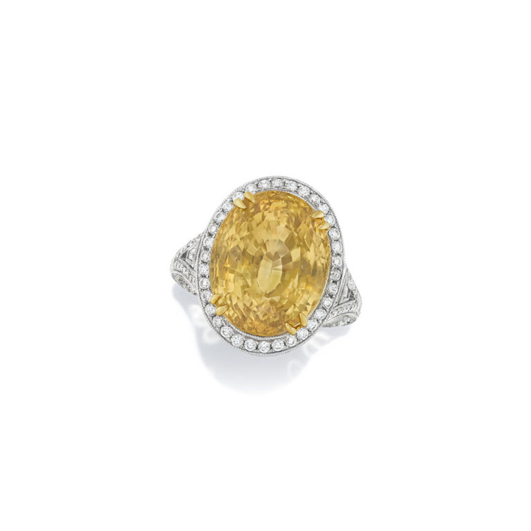 Platinum colored sapphire and diamond ring