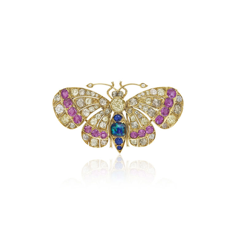 Yellow gold colored diamond and multi-gem butterfly brooch
