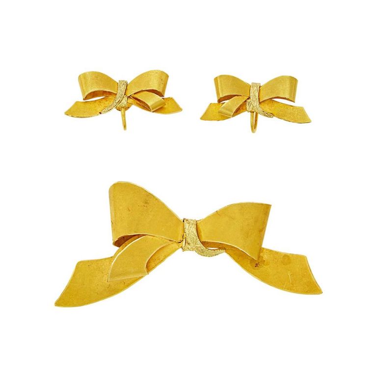 18k gold bow brooch and earclips