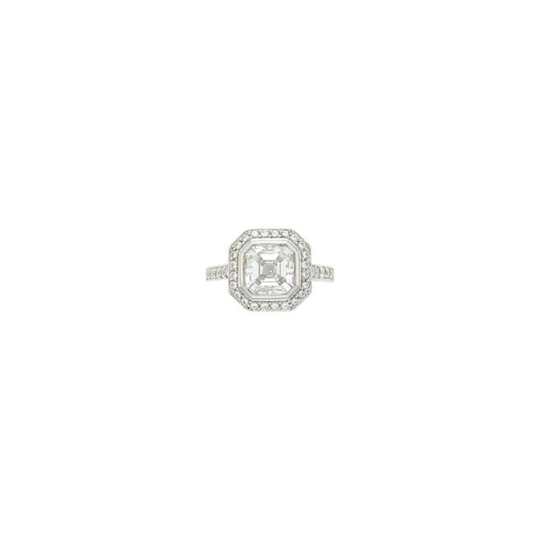 Platinum ring with emerald-cut diamond