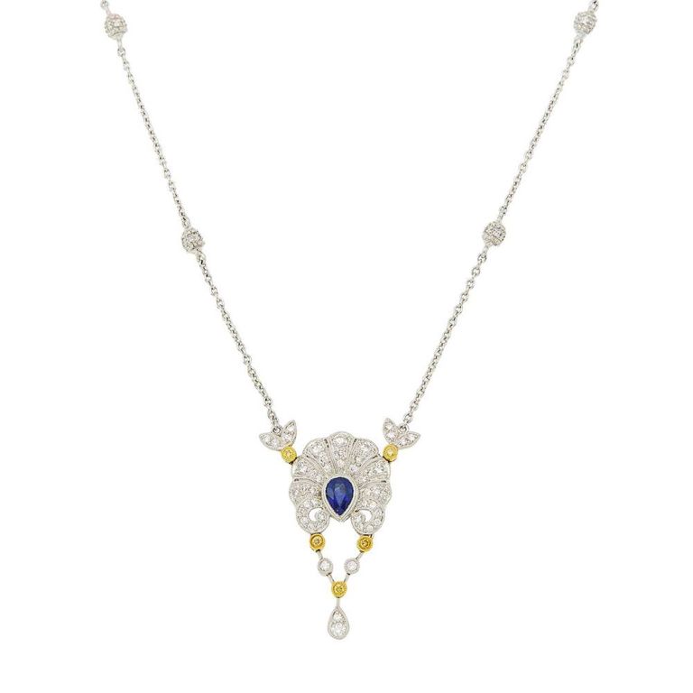 Platinum, yellow and white gold sapphire and diamond pendant necklace