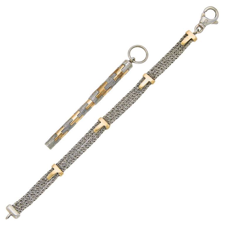 Tiffany & Co. silver and gold multistrand bracelet with Gucci pen pendant