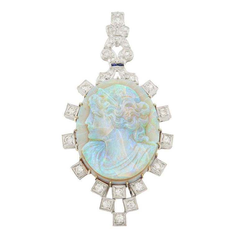 Platinum opal cameo and diamond pendant