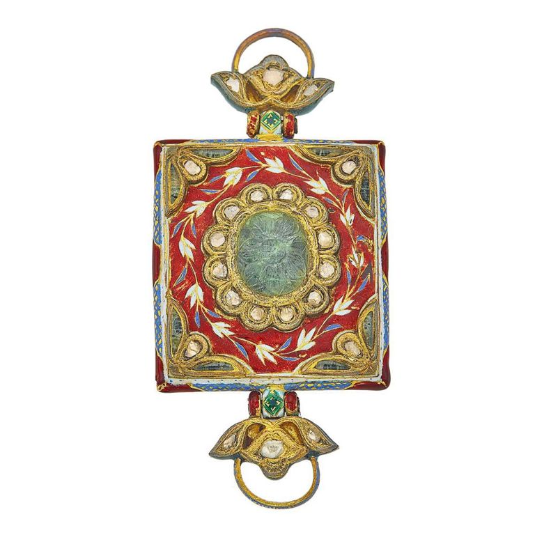 Indian gilt-metal carved emerald and foil-backed diamond buckle pendant