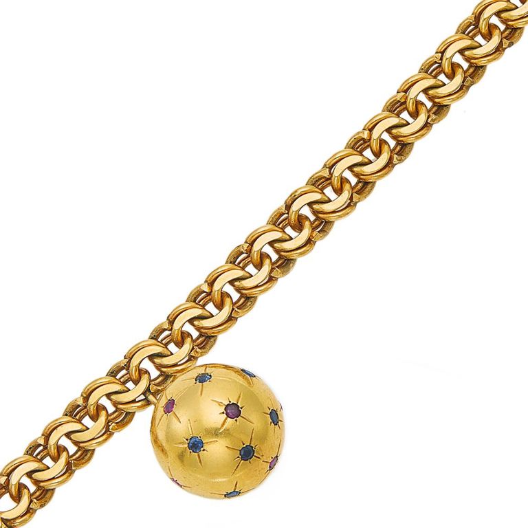 14k gold bracelet with gold and gem-set ball charm