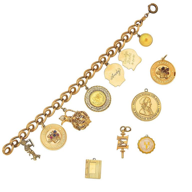 14k yellow and rose gold charm bracelet with loose charms