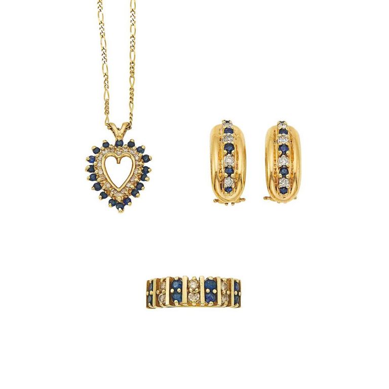 14k gold pendant necklace, earclips, and ring with sapphire and diamond