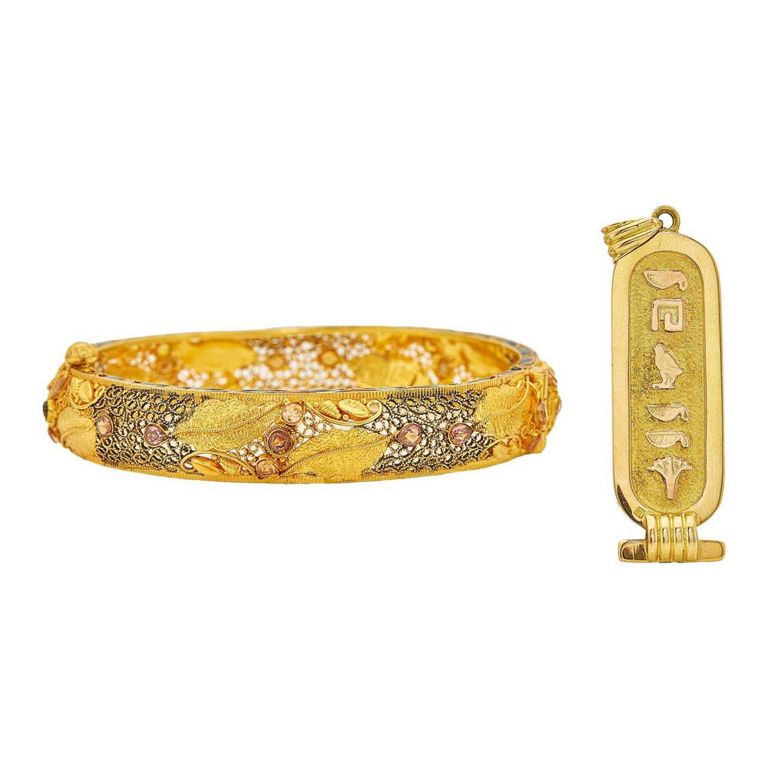 18k gold, enamel, and paste bangle bracelet with Egyptian pendant