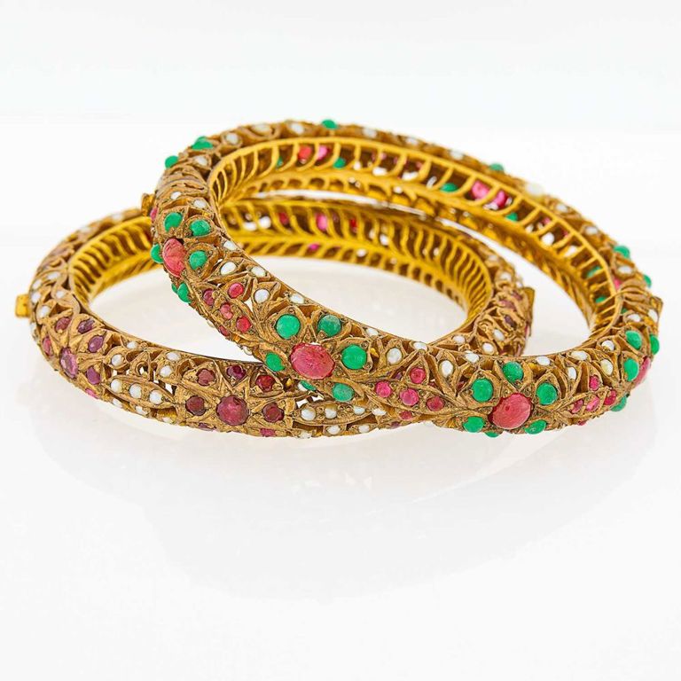 Silver-gilt bangle bracelets with rubies, emeralds and pearls