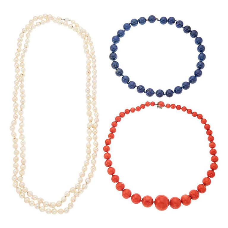 Coral, lapis, and baroque pearl bead necklaces with gold clasp