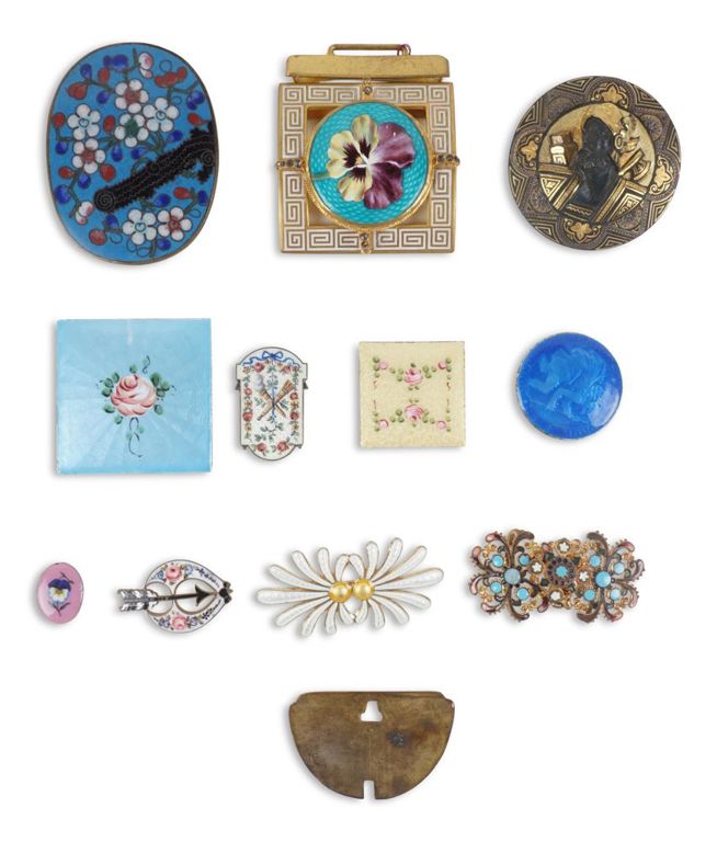 Group of enameled buckles, plaques and brooches