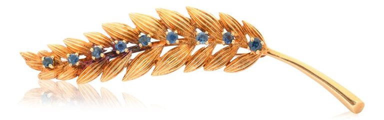 18k yellow gold and sapphire leaf brooch