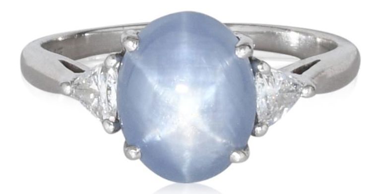 Contemporary platinum star sapphire and diamond ring