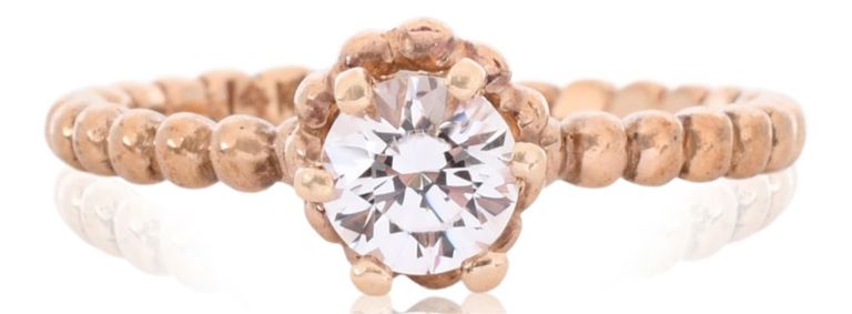10k yellow gold ring with white sapphire