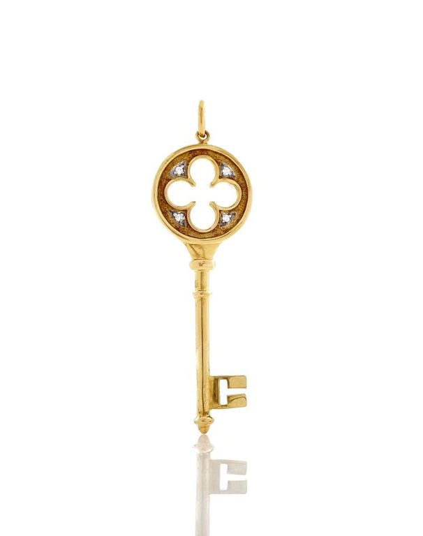 Tiffany & Co 18k yellow gold diamond clover key pendant