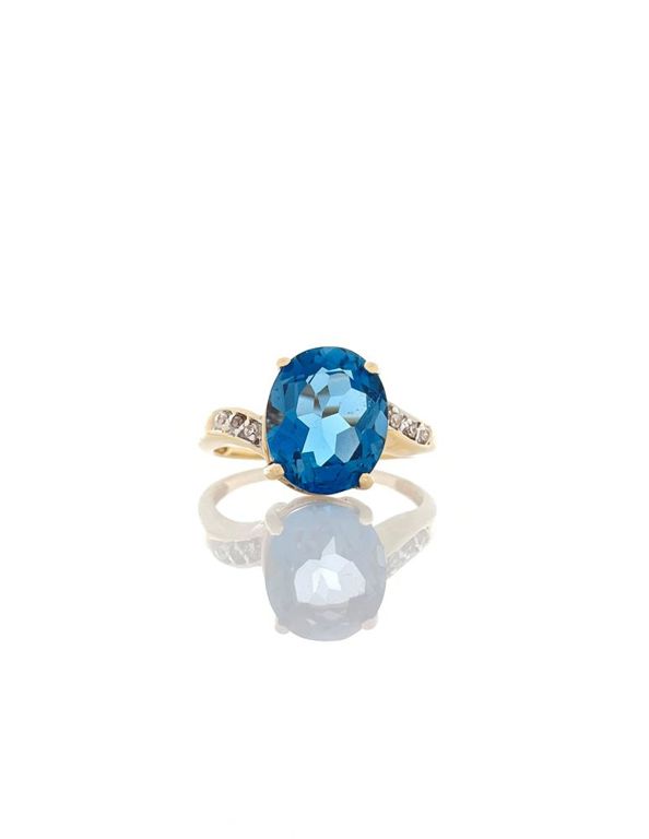 14k yellow gold blue topaz diamond ring
