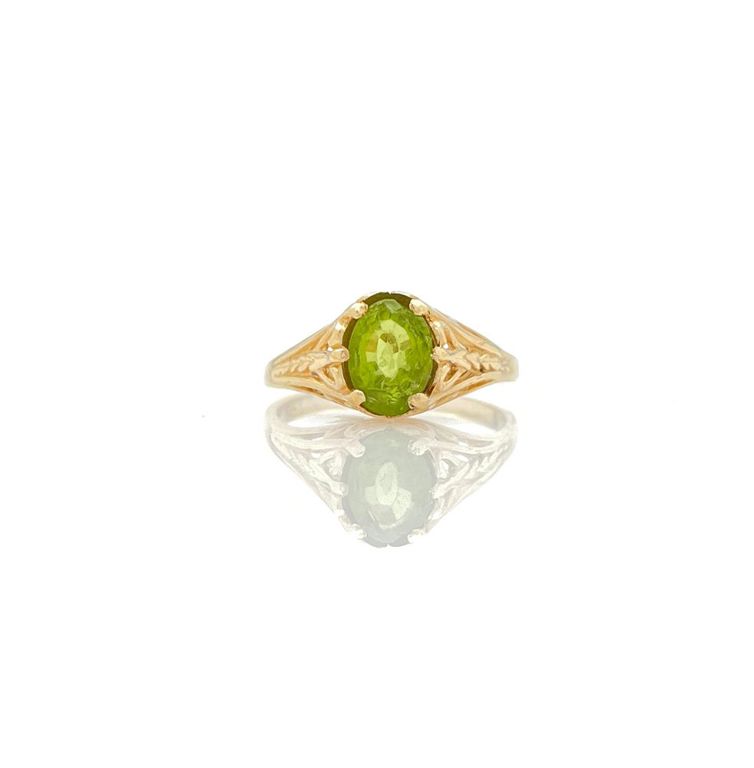 14k yellow gold ring with peridot