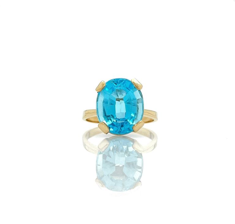 14k yellow gold ring with blue topaz