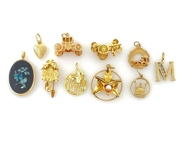 14k and 18k yellow gold pendants and charms