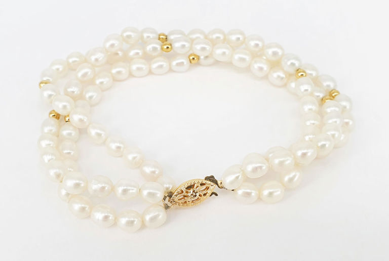 14k gold three strand freshwater pearl bracelet