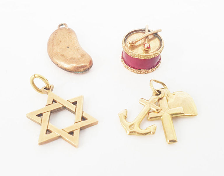 Four 9k gold charms