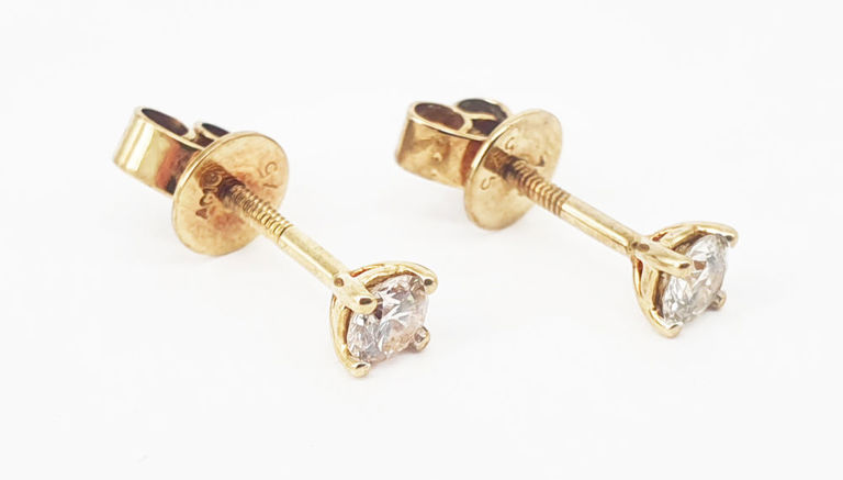 Pair of 9k gold and diamond stud earrings