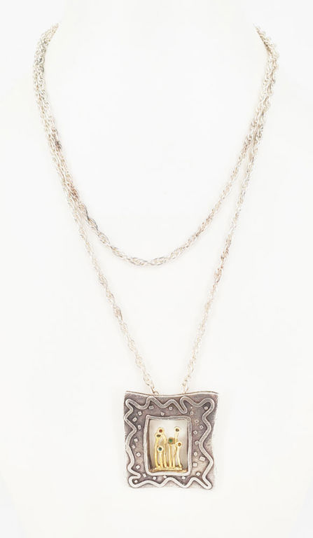 A 14k GOLD AND STERLING SILVER DESIGNER PENDANT