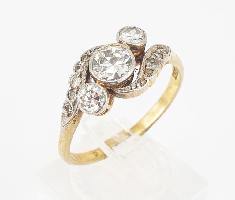 Platinum and 18k gold diamond crossover ring