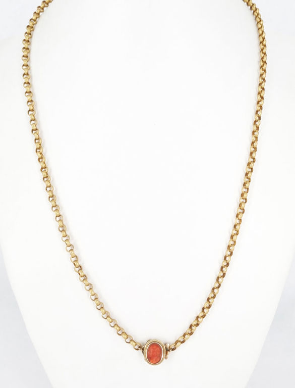 An antique gold part muff chain