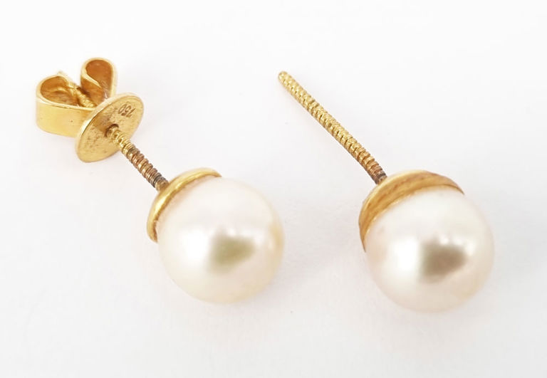 A PAIR OF CULTURED PEARL AND 18k GOLD EAR-STUDS