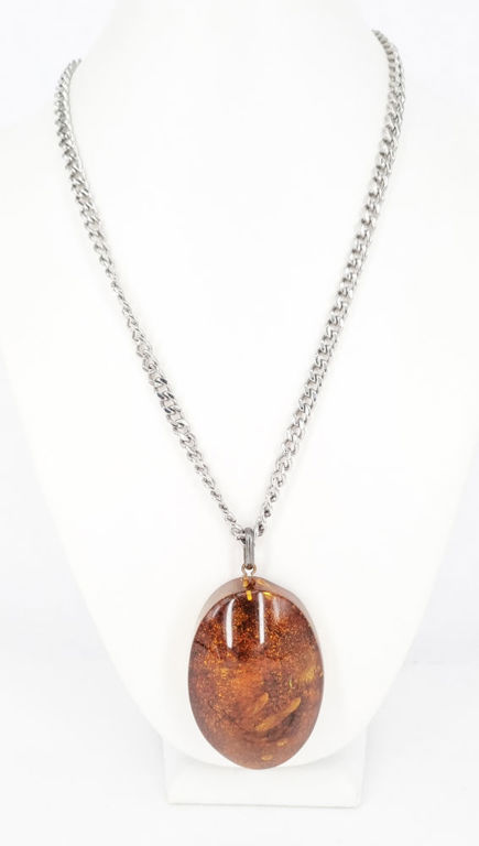 Large amber pendant with sterling silver bail on stainless steel chain
