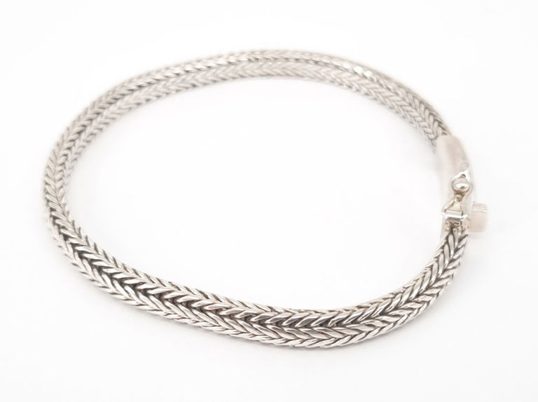 Silver bracelet with braided link design