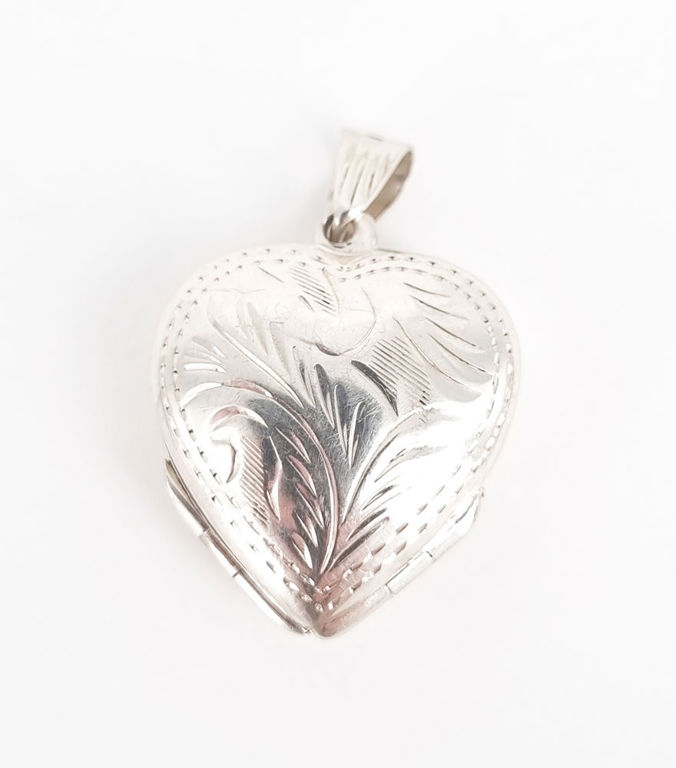 Silver heart-shaped locket
