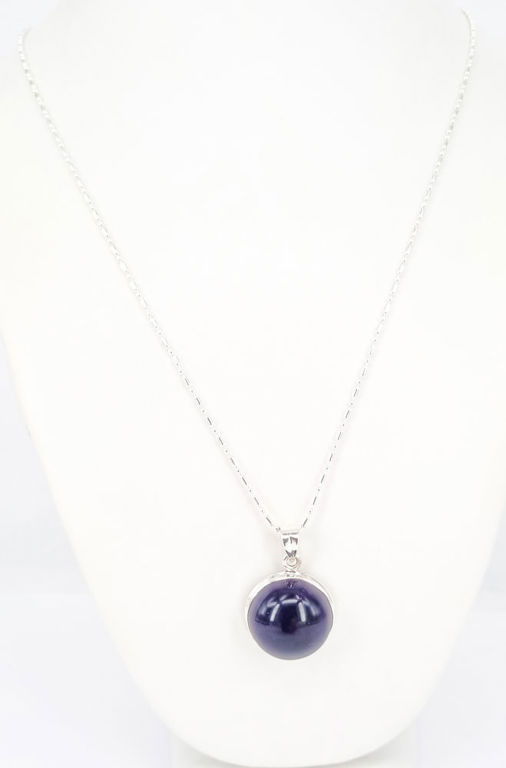 Sterling silver and cabochon amethyst pendant on sterling silver chain