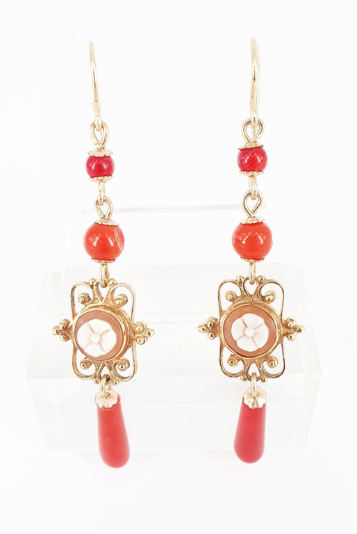 A pair of coral and cameo drop earrings