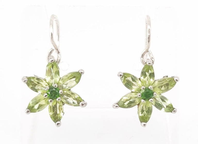 A pair of peridot and green garnet floral drop earrings