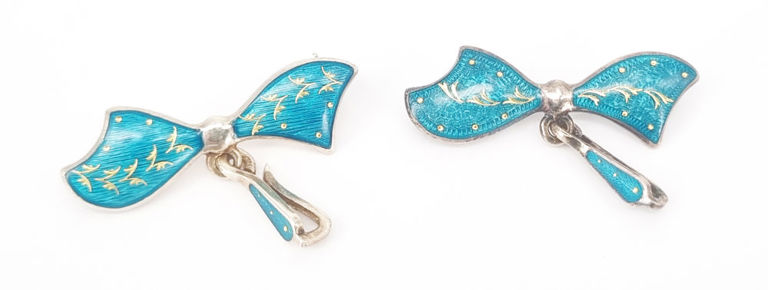 Two vintage watch brooches in sterling silver gilt and enamel
