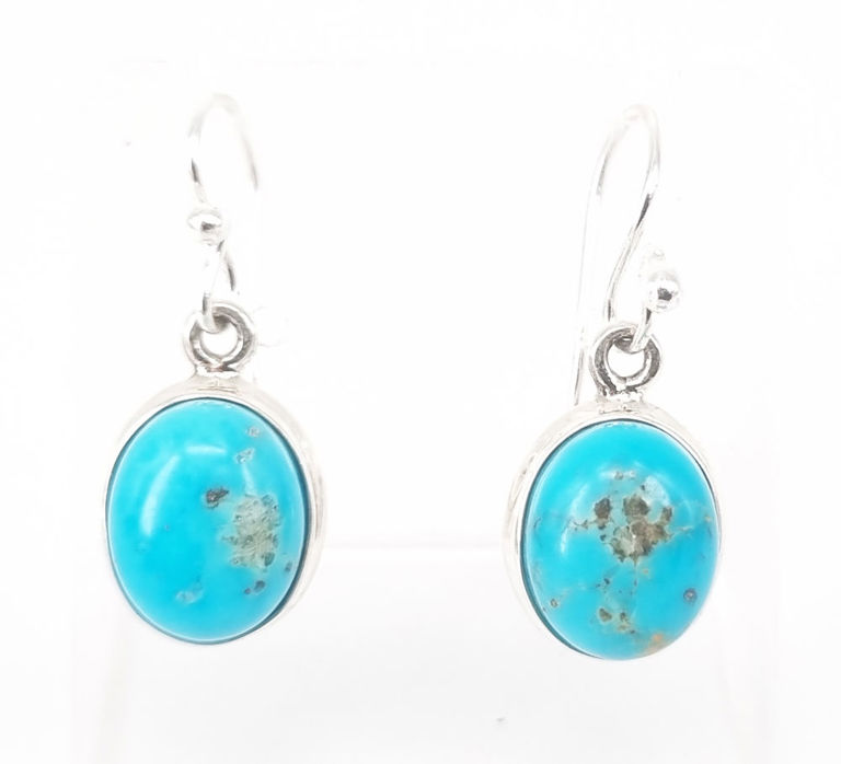 A pair of turquoise drop earrings in sterling silver