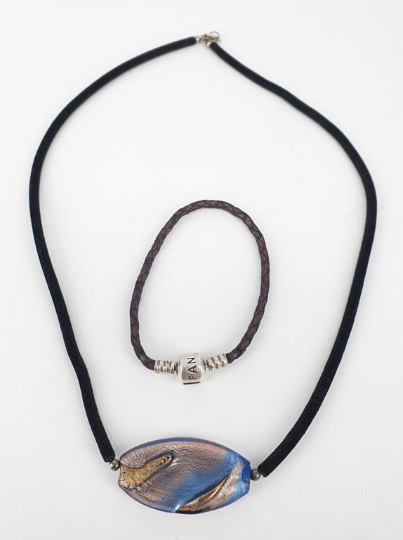 A Pandora bracelet in silver and woven leather with a silver and art glass necklace