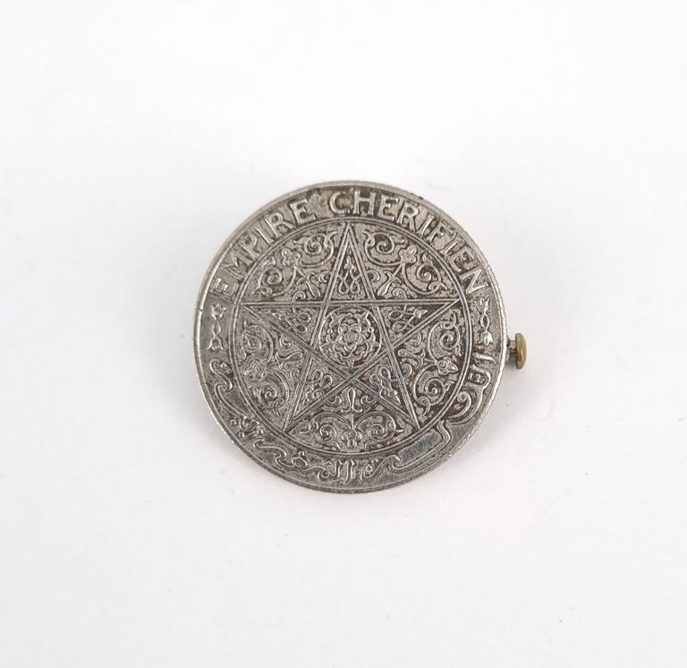 An early 20th century Moroccan 1 franc coin brooch