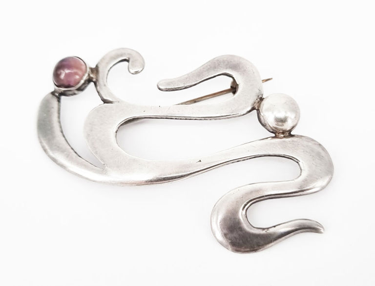 Mexican sterling silver brooch with amethyst cabochon