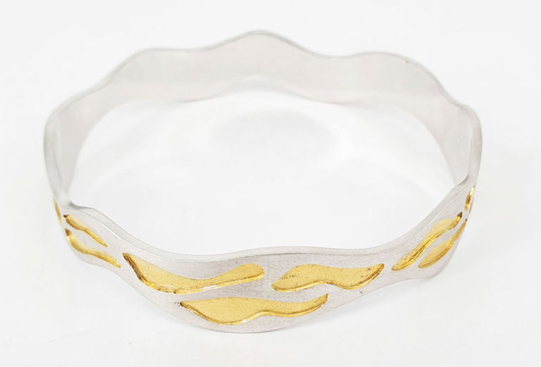 Designer silver bangle