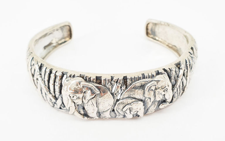 Vintage solid silver cuff bangle with elephant and bamboo motif