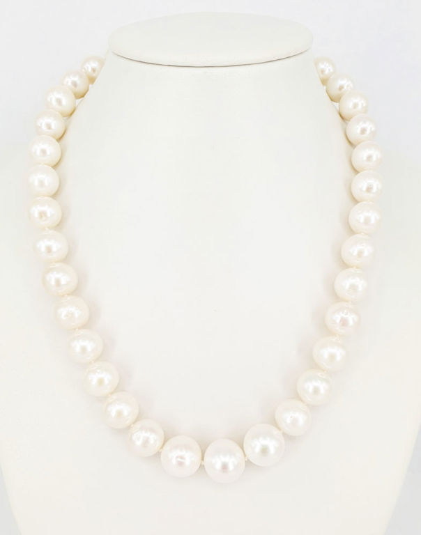 Graduated round pearl necklace with 14k gold ball clasp