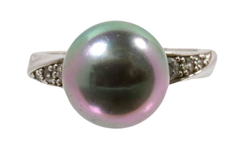 Sterling silver ring with synthetic pearl and cubic zirconia