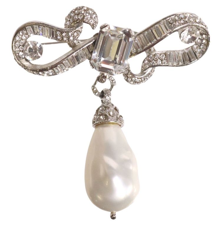 Silver-tone metal brooch with rhinestone and faux baroque pearl