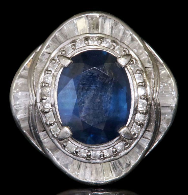 Platinum ballerina ring with blue sapphire and diamond